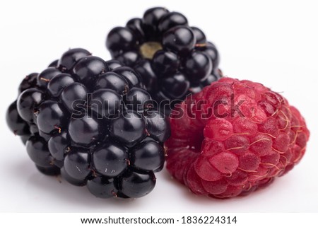 blackberry and raspberry closeup on white background