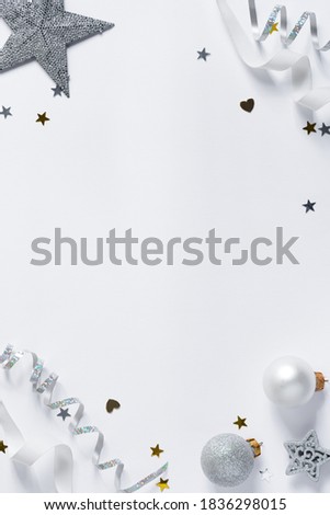 Christmas background with silver ribbon and decoration.