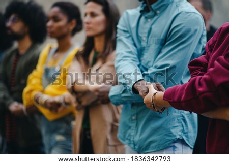 Group of people activists protesting on streets, women march and demonstration concept. Royalty-Free Stock Photo #1836342793
