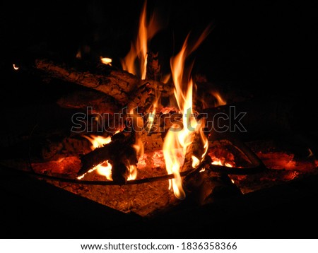 Summer camp fireplace in the dark