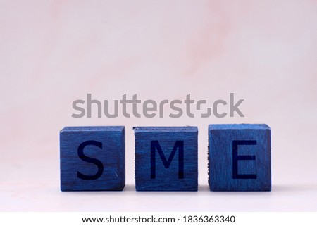 wooden cube block with business icons on white background and business idea concept