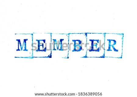 Blue color ink of rubber stamp in word member on white paper background