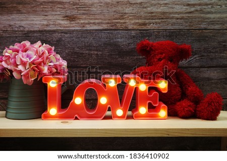 Pink Love LED Decorative on wooden background