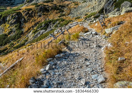 Autumn scene in Mengusovska valley, High Tatras mountains, Slovak republic. Hiking theme.