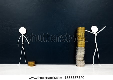 Saving and investing concept. Human stick figure beside low and high stack of coins.