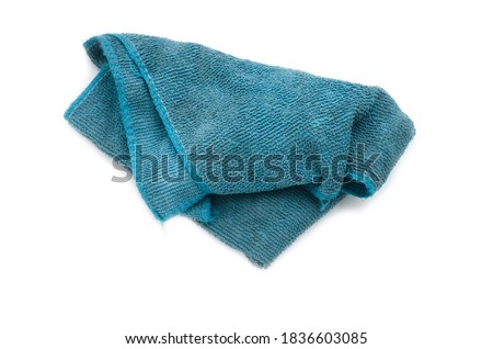 Old dirty torn rag isolated on white background. Cleaning rag. Royalty-Free Stock Photo #1836603085
