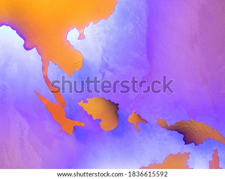 The picture of purple and yellow patterned background resembling a world map.