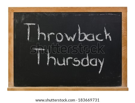 Throwback Thursday hand written in white chalk on a black chalkboard isolated on white Royalty-Free Stock Photo #183669731