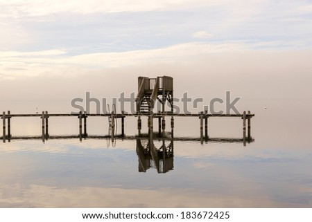 Wooden Dock by the Fishing Quiet Lake 