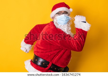isolated santa claus with sanitary mask