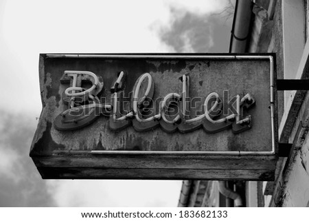 Old neon sign from the past, German word "Bilder", translation: pictures