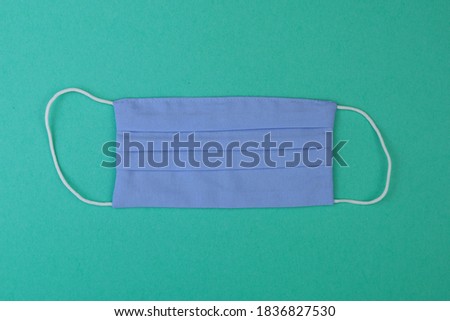 A clean and new medical surgical mask that must be worn in public during the period of the infectious disease pandemic