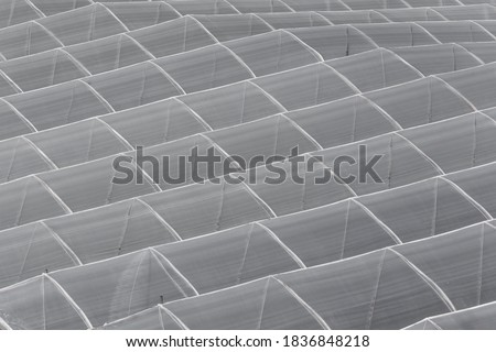 white plastic background with rows of rectangles, geometric figures