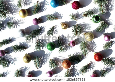texture of spruce twigs and Christmas toys