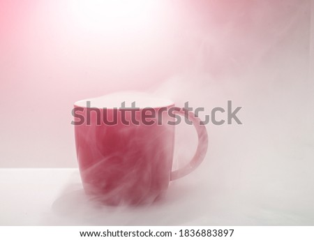 Red coffee cup picture with white haze