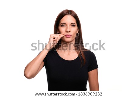 Isolated in white background brunette woman saying boy in spanish sign language