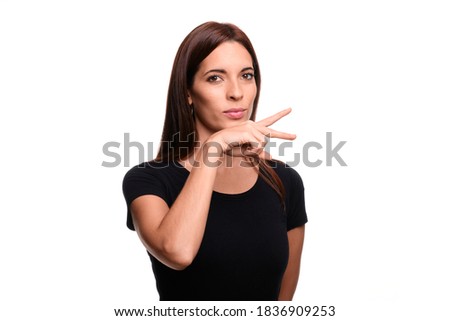 Isolated in white background brunette woman saying talk in spanish sign language