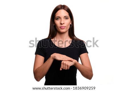 Isolated in white background brunette woman saying sorry in spanish sign language