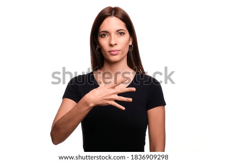 Isolated in white background brunette woman saying white in spanish sign language