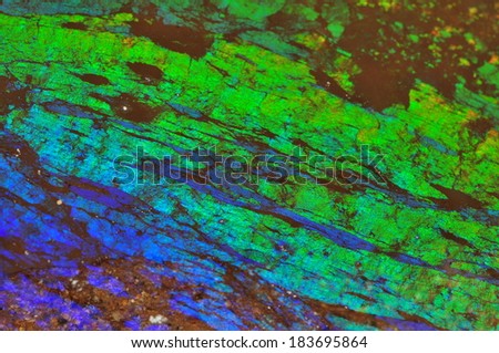 Layer of oil on water inside a mine. 