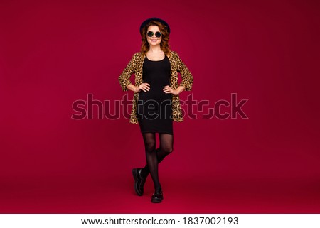 Full length body size view of her she nice-looking attractive fashionable pretty lovely cheerful cheery wavy-haired girl posing isolated over red marsala burgundy maroon color background