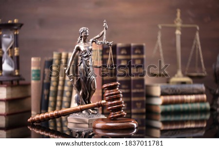 Law code concept background. Justice symbols on glossy table. Royalty-Free Stock Photo #1837011781