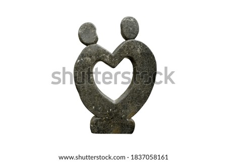 Marble rock stone with heart-shaped holes isolated on white background with clipping path. For decorating the garden of love.
