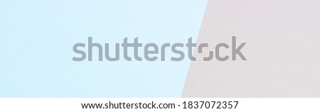 Abstract geometric texture banner background of fashion pastel blue and gray tone color paper. Top view, flat lay