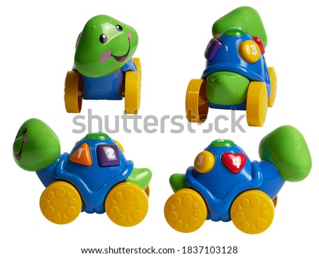 turtle shape in wheel car baby toy on isolated white background