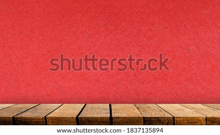 Wooden display board shelf table counter with copy space for advertising backdrop and background with red paper wall background,