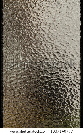 detail shot of a cellar window, nice glass surface, macro photo basement window.