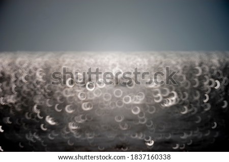 Abstract background. Glare on the water.