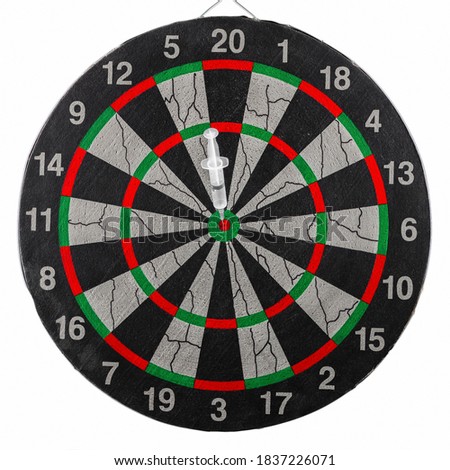 Disposable syringe in the bull's eye of the dart board. Correctly selected treatment, coronavirus vaccine concept. High quality photo