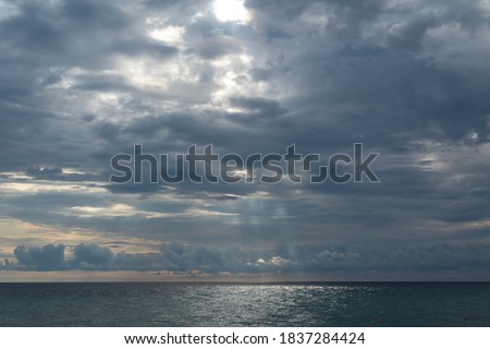Beautiful background with sunset on the black sea. Cloudy sky and waves. Sochi, Russia, September 29, 2019 Royalty-Free Stock Photo #1837284424