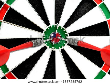 Close-up of a dart board with an imprinted flag of Taiwan in the center. The concept of achieving goals.