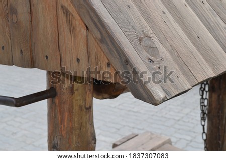 wooden roof of a well