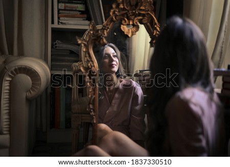 picture of girl through a mirror