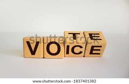 Turned cubes and changed the word 'voice' to 'vote'. Beautiful white background. Concept. Copy space.