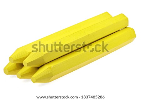 yellow marking crayon isolated on white background