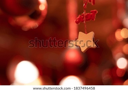 Christmas star blurred red background with bokeh illumination holidays eve decoration festive atmosphere in soft focus concept picture 