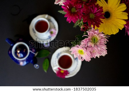 Tea and cake with flowers