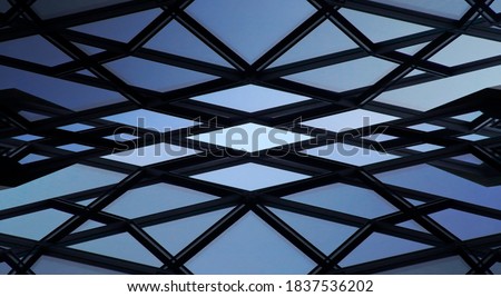 Double exposure photo of structural glazing. Windows of realistic though unreal hi-tech building. Abstract modern architecture. Geometric background of frames. Polygonal pattern of glass panels.