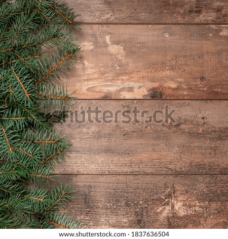 Rustic Christmas background with fir branches. Christmas background with fir tree and decor. Top view with copy space. winter