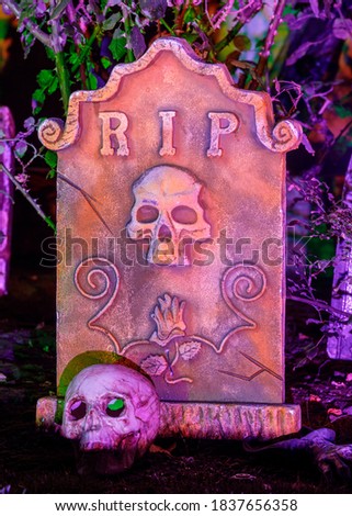 Halloween Rest In Peace Tombstone and Skull  Decorating Yard at Night