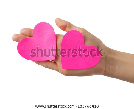 Empty heart shaped paper notes on hand