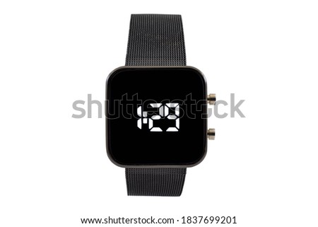 Square smartwatch with black mesh style strap, black dial face and digital numerals, isolated on white background. Royalty-Free Stock Photo #1837699201