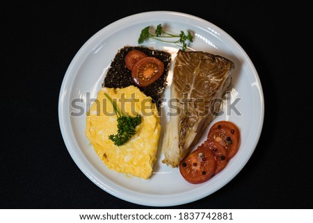smoked greenland halibut with tomato salad bread and eggs 