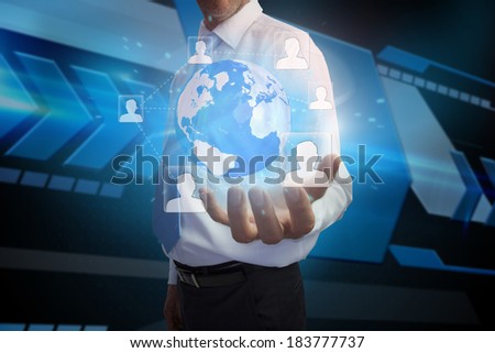 Digital composite of businessman presenting earth with profile pictures
