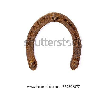Vintage rusty old horseshoe for horses Isolated a white background. A symbol of happiness and good luck