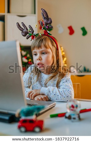 Girl making video call in Christmas time